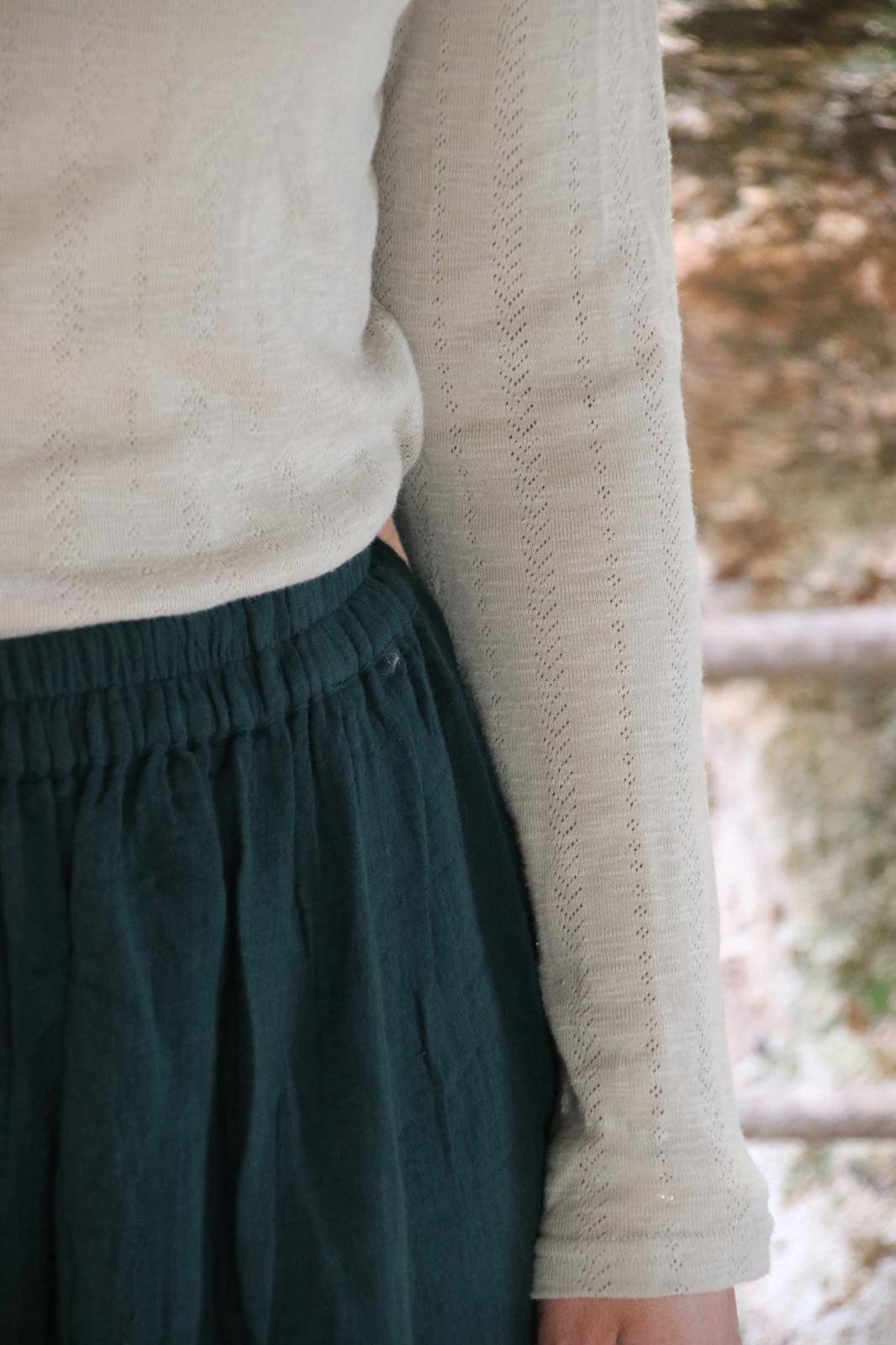 הַשּׁוֹזֶרֶת- ירוק בקבוק